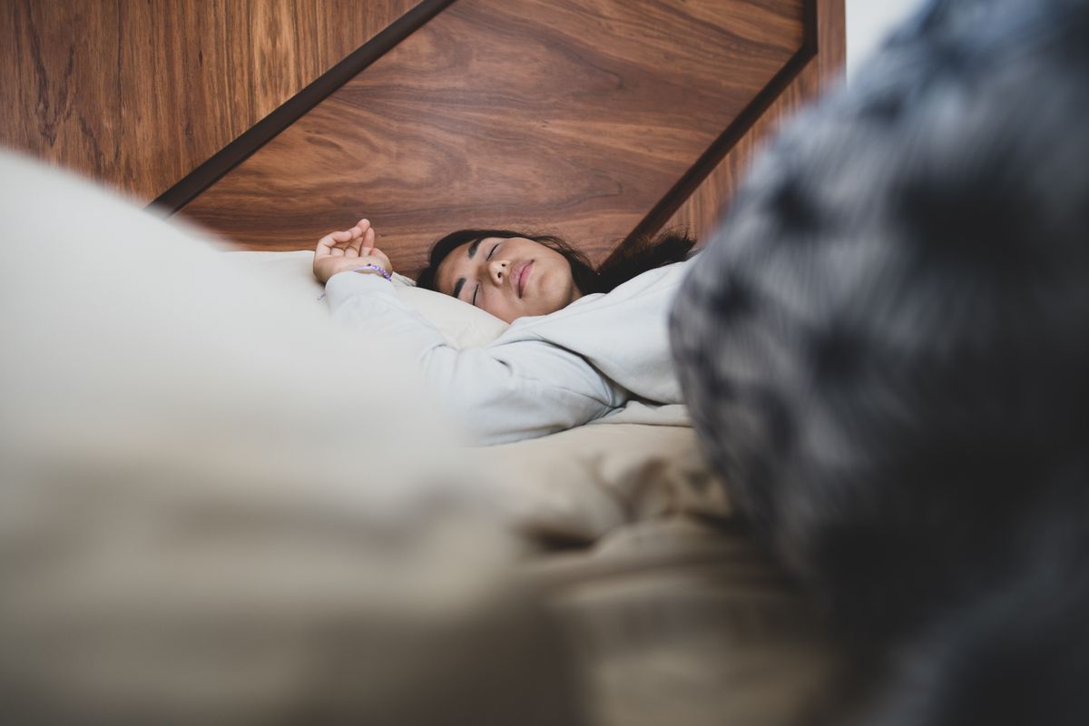 Woman sleeping at home